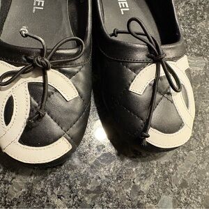 Chanel black leather ballet slippers